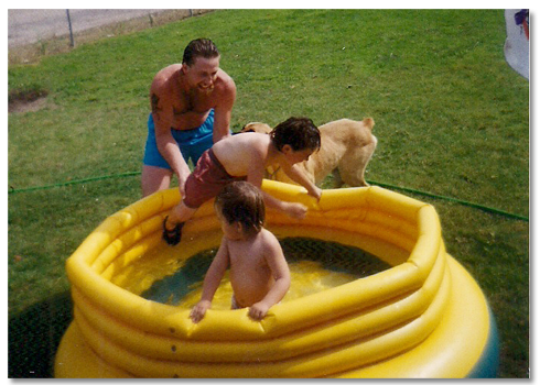 Photo of Tracy, Brock and Mitch Walquist playing in the pool.