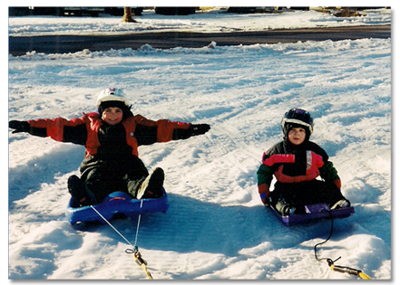 Photo of Brock and Mitch Walquist sledding